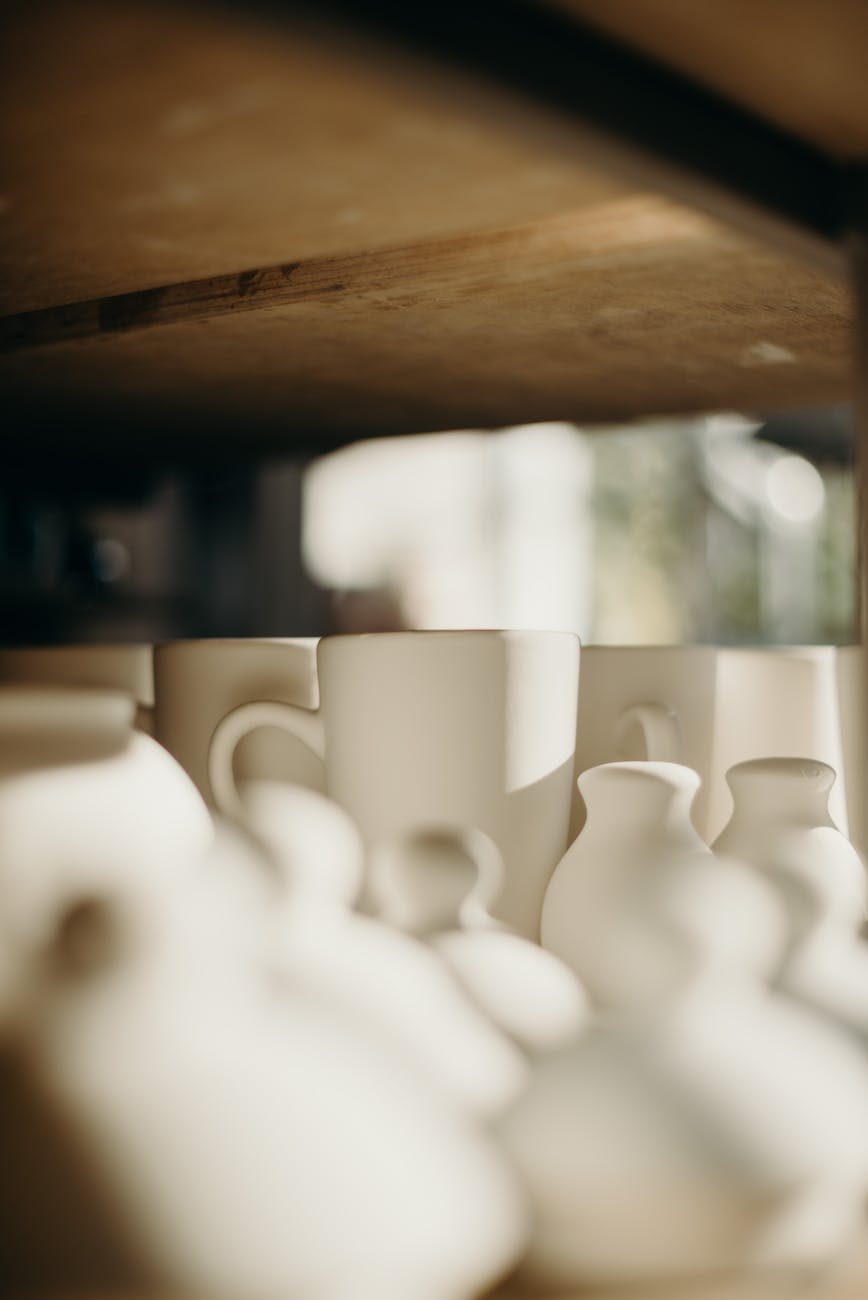 selective focus photo of mugs